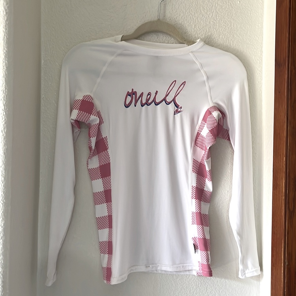 O’Neill like new juniors/girls rash guard. White and pink. 50 spf. Summer wear